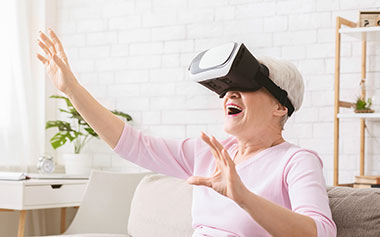 Woman experiencing virtual reality wearing VR headset